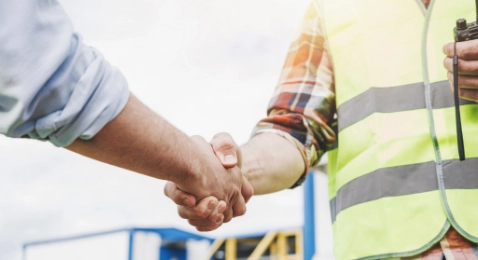 Workers Shaking Hands