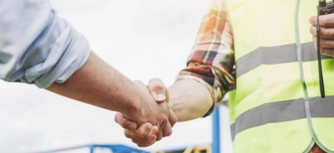 Workers Shaking Hands