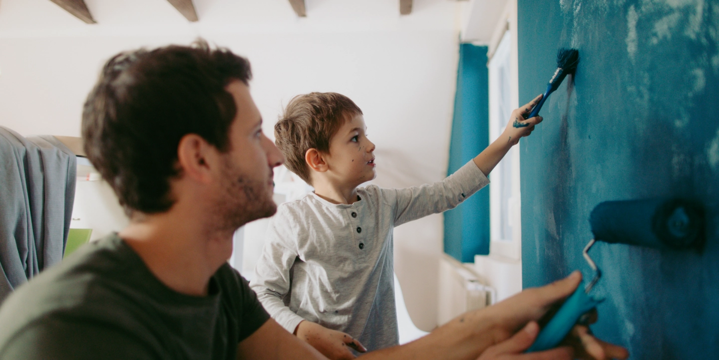 Father and Son Painting Together